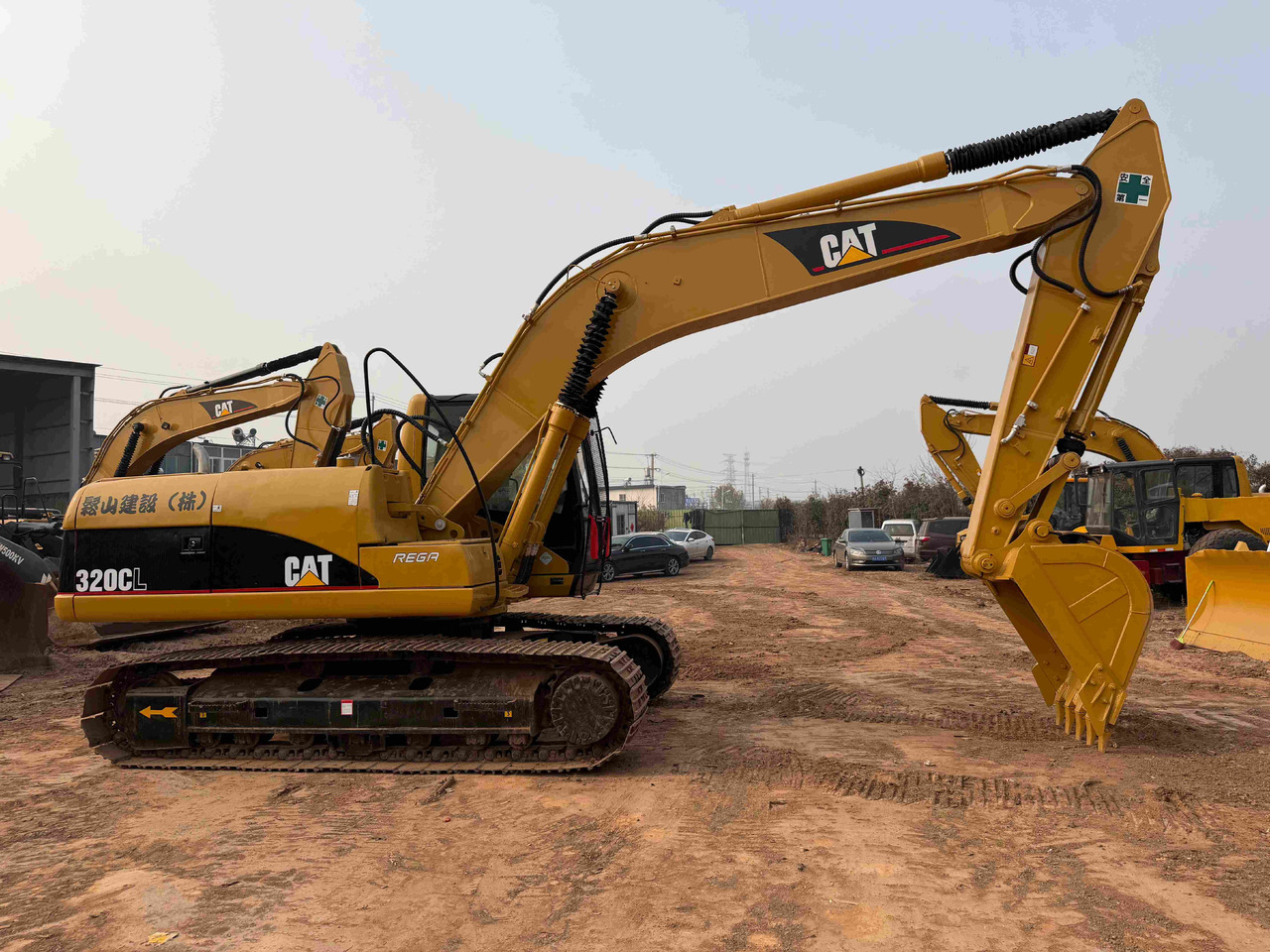 CATERPILLAR 320CL - Ekskavators: foto 1 CATERPILLAR 320CL - Ekskavators: foto 1