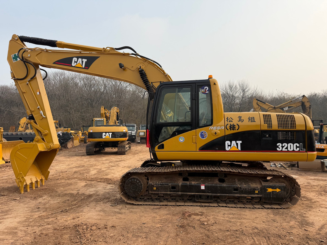 CATERPILLAR 320CL - Ekskavators: foto 2 CATERPILLAR 320CL - Ekskavators: foto 2