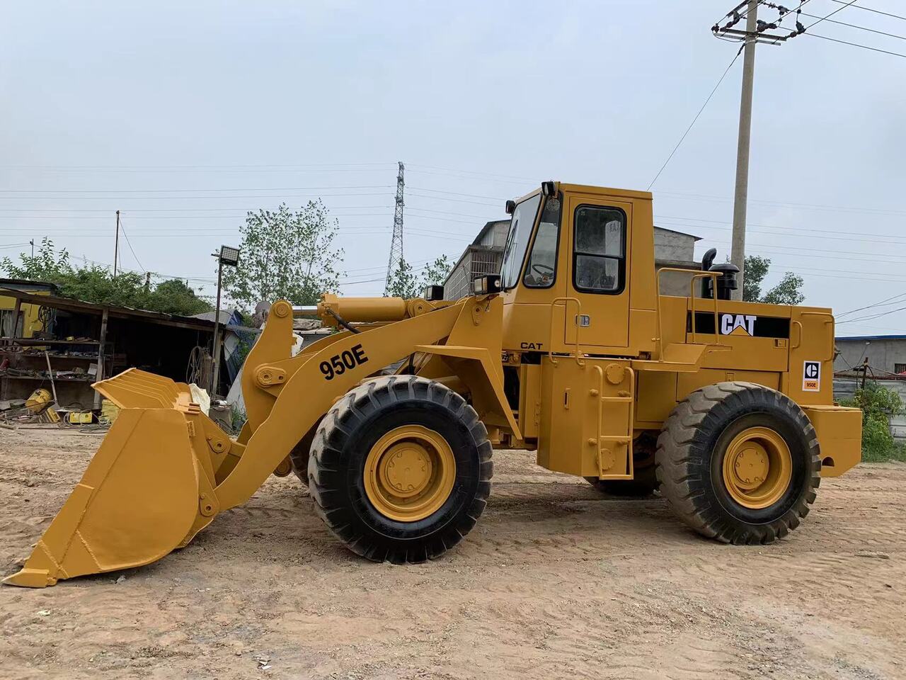 CATERPILLAR 950E - Riteņu iekrāvējs: foto 2 CATERPILLAR 950E - Riteņu iekrāvējs: foto 2
