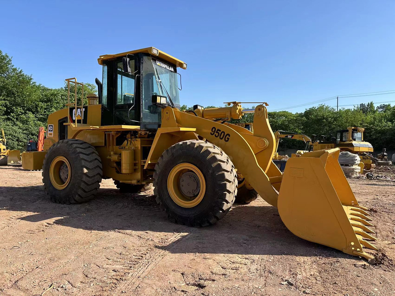 CATERPILLAR 950G - Riteņu iekrāvējs: foto 1 CATERPILLAR 950G - Riteņu iekrāvējs: foto 1