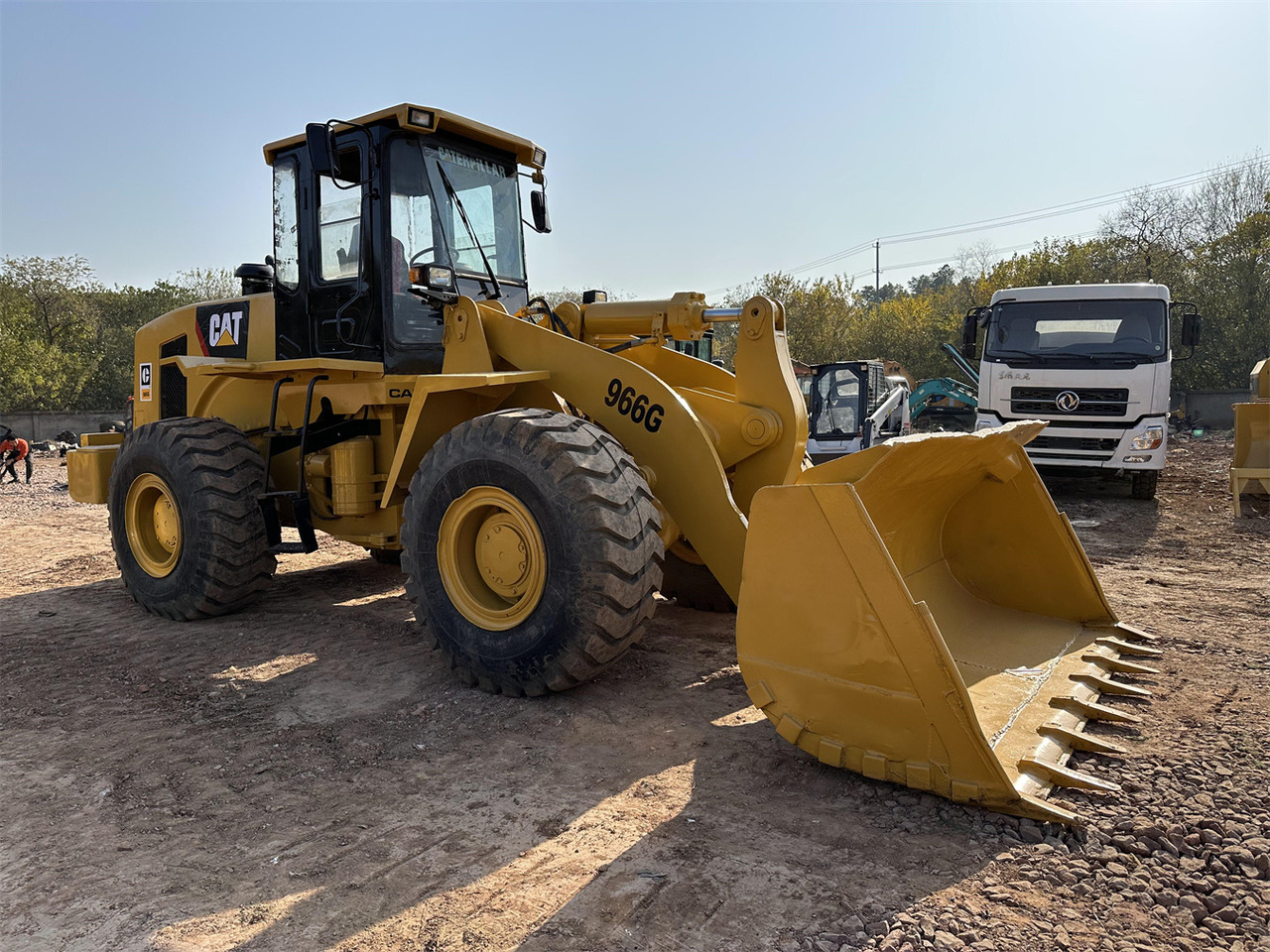 CATERPILLAR 966G - Riteņu iekrāvējs: foto 1 CATERPILLAR 966G - Riteņu iekrāvējs: foto 1