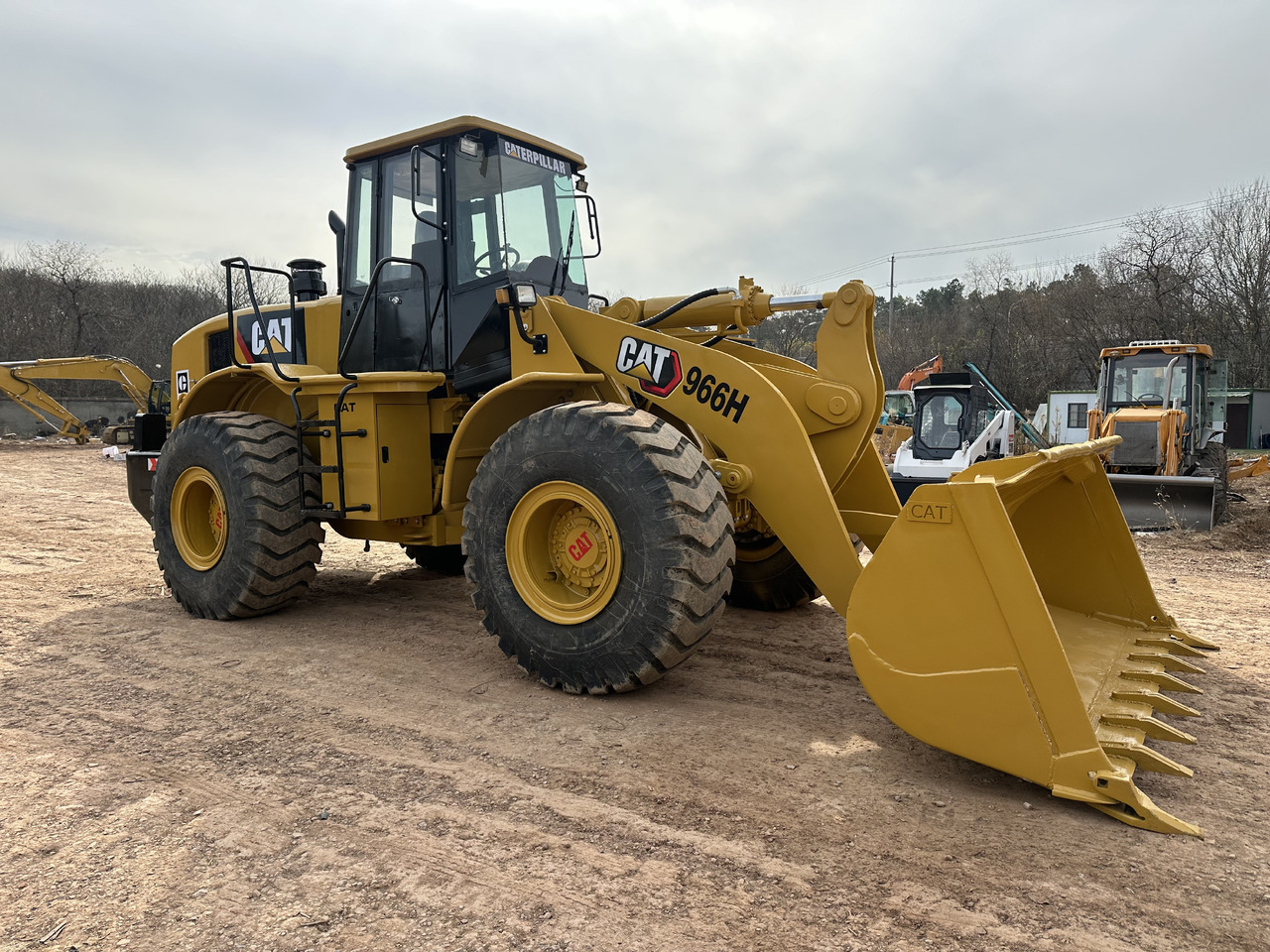 CATERPILLAR 966H - Riteņu iekrāvējs: foto 1 CATERPILLAR 966H - Riteņu iekrāvējs: foto 1