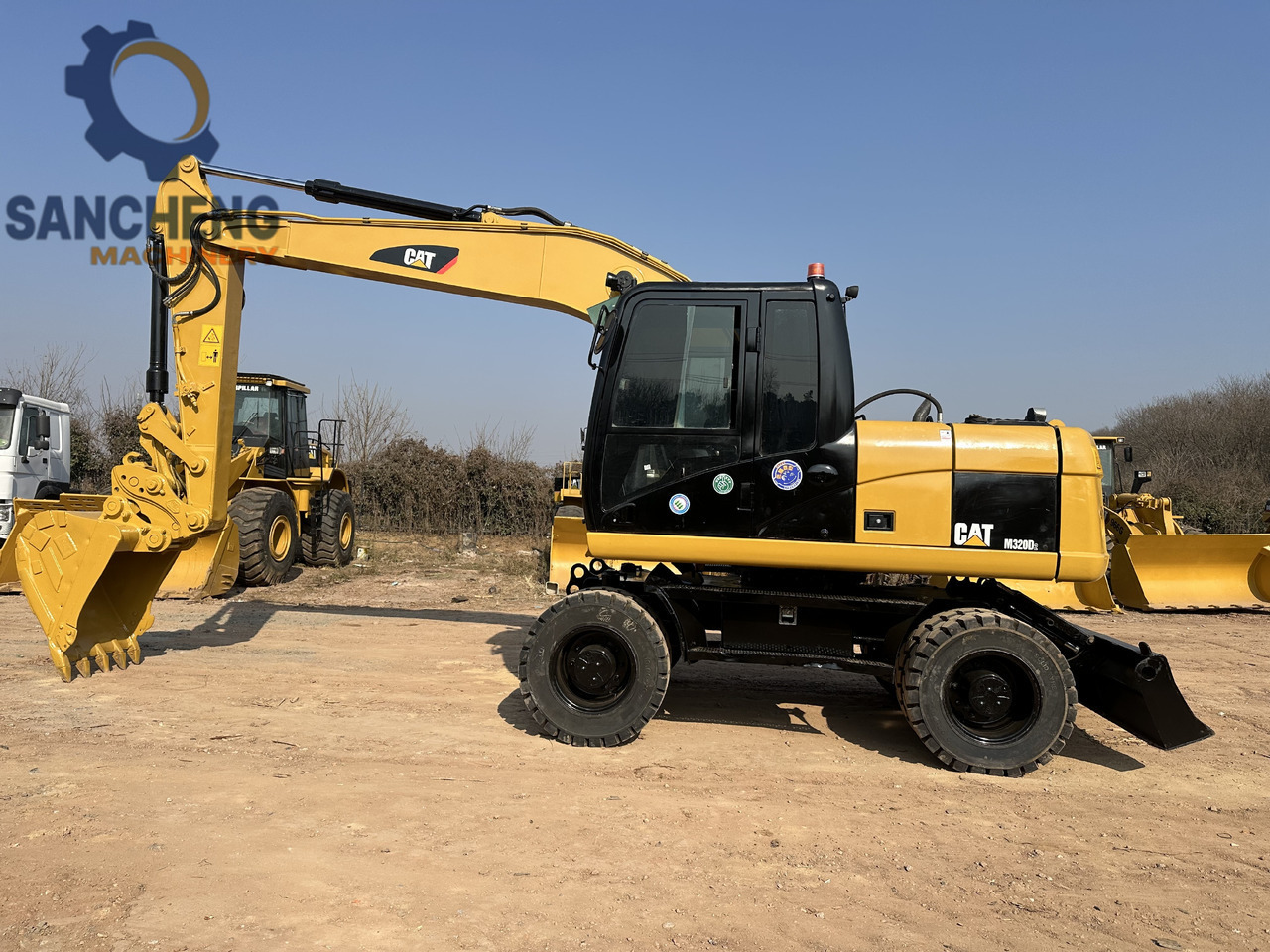 CATERPILLAR M320D2 - Riteņu ekskavators: foto 3 CATERPILLAR M320D2 - Riteņu ekskavators: foto 3