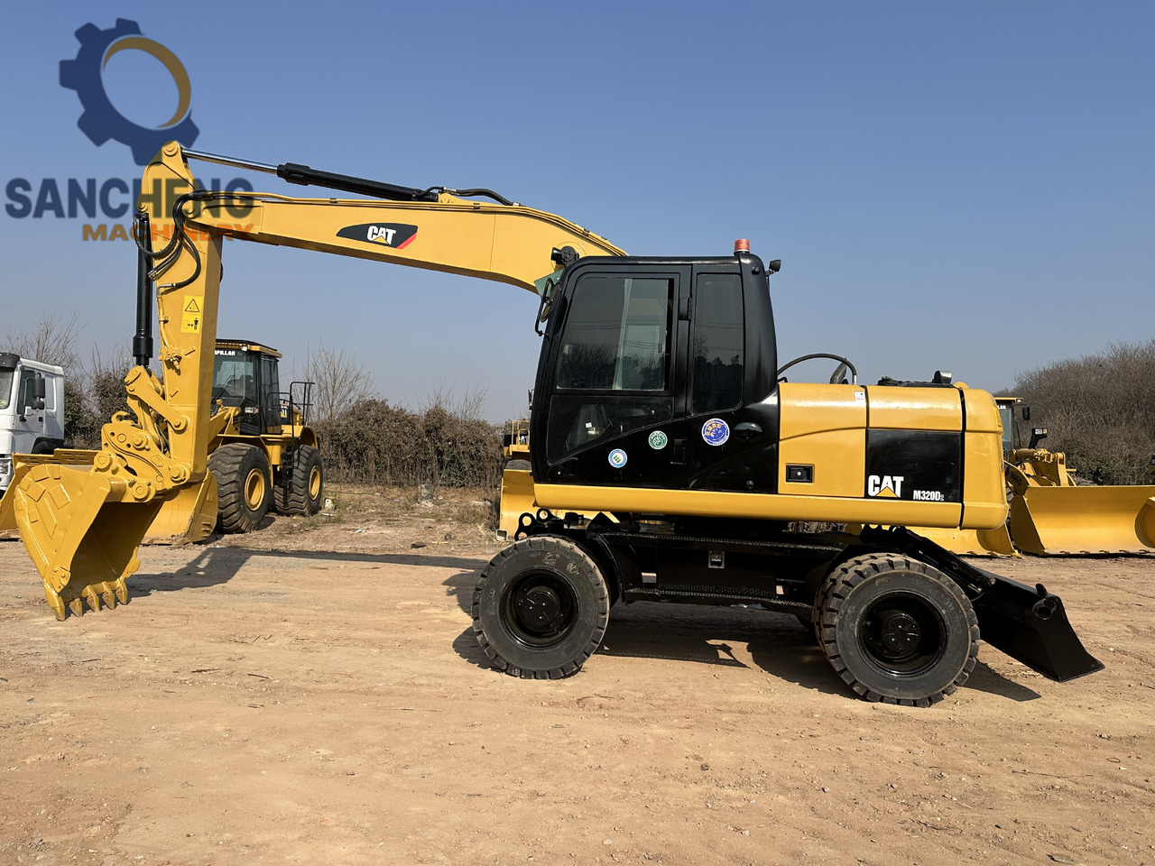 CATERPILLAR M320D2 - Riteņu ekskavators: foto 2 CATERPILLAR M320D2 - Riteņu ekskavators: foto 2