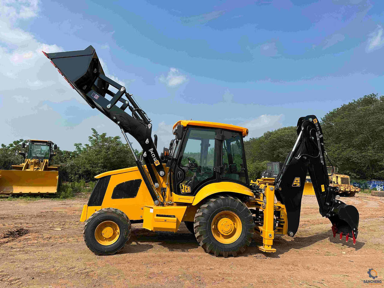 JCB 3CX - Ekskavators-iekrāvējs: foto 1 JCB 3CX - Ekskavators-iekrāvējs: foto 1