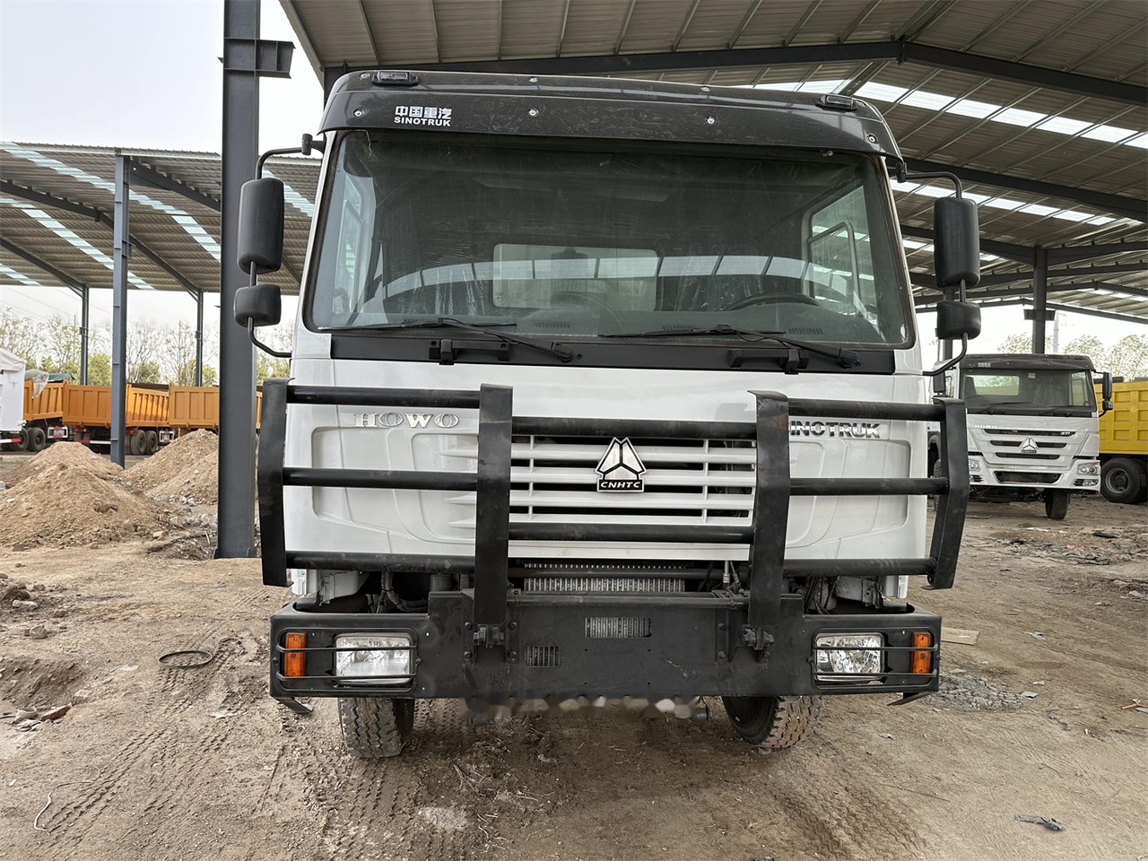 SINOTRUK HOWO 371 Dump Truck - Kravas automašīna pašizgāzējs: foto 2 SINOTRUK HOWO 371 Dump Truck - Kravas automašīna pašizgāzējs: foto 2