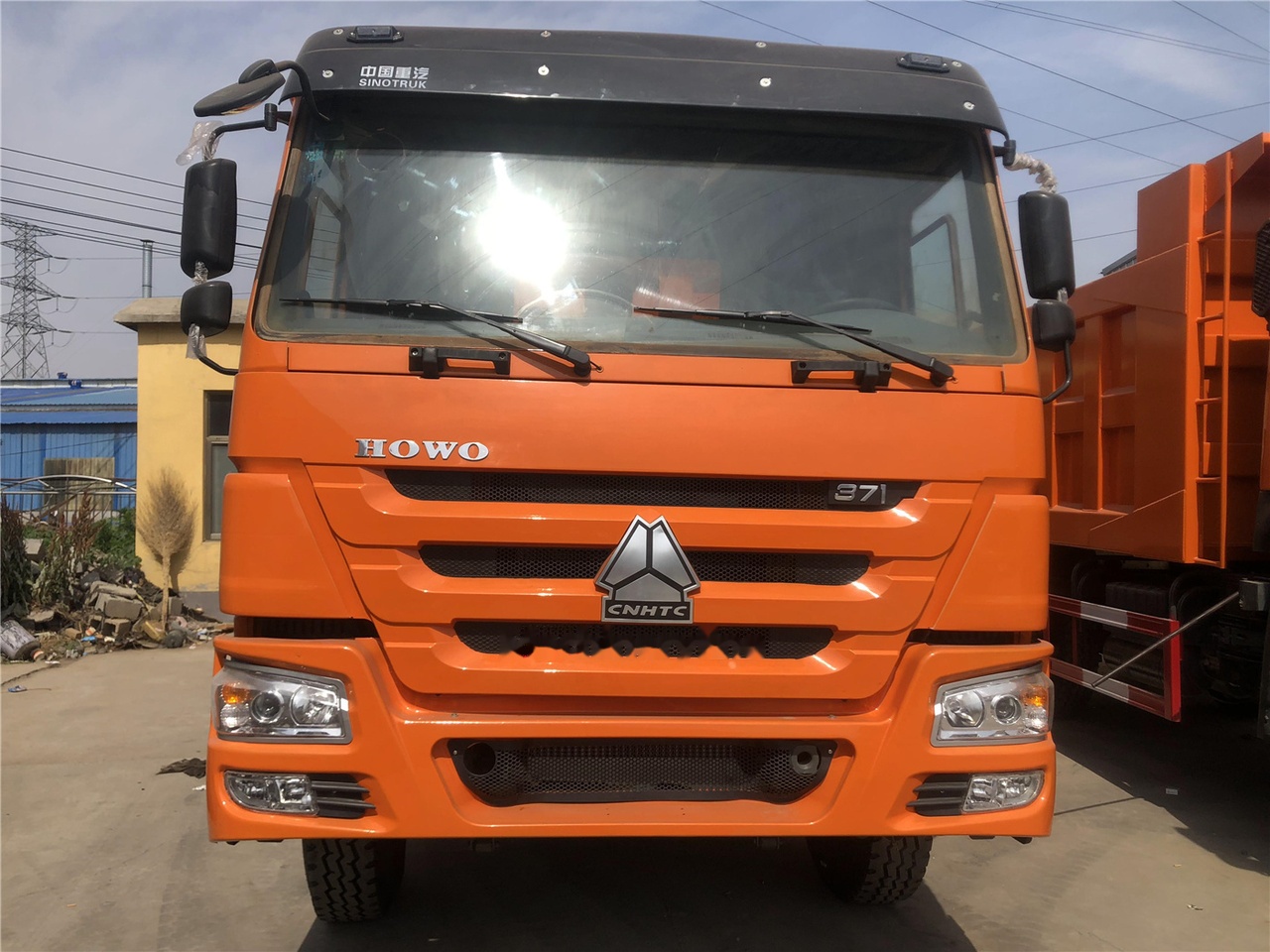 SINOTRUK HOWO 371 Dump truck - Kravas automašīna pašizgāzējs: foto 2 SINOTRUK HOWO 371 Dump truck - Kravas automašīna pašizgāzējs: foto 2