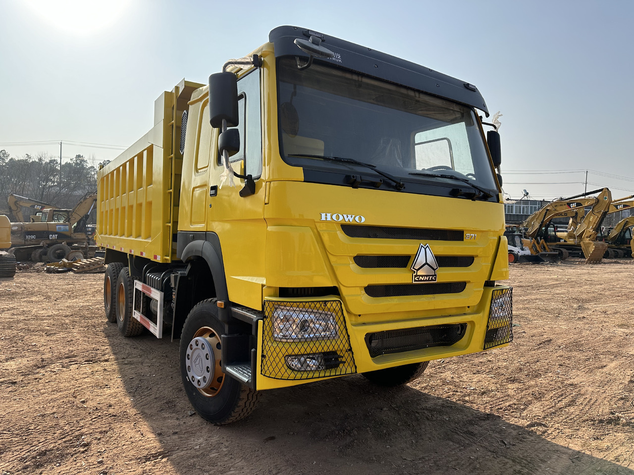 SINOTRUK HOWO 371 - Kravas automašīna pašizgāzējs: foto 1 SINOTRUK HOWO 371 - Kravas automašīna pašizgāzējs: foto 1