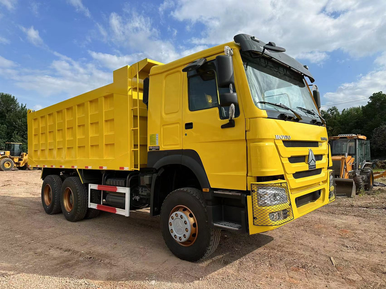 SINOTRUK Howo 371 Dump truck - Kravas automašīna pašizgāzējs: foto 2 SINOTRUK Howo 371 Dump truck - Kravas automašīna pašizgāzējs: foto 2