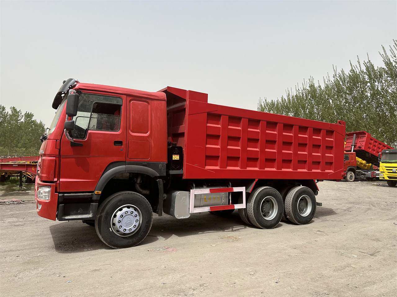 SINOTRUK Howo Dump truck 371 - Kravas automašīna pašizgāzējs: foto 5 SINOTRUK Howo Dump truck 371 - Kravas automašīna pašizgāzējs: foto 5