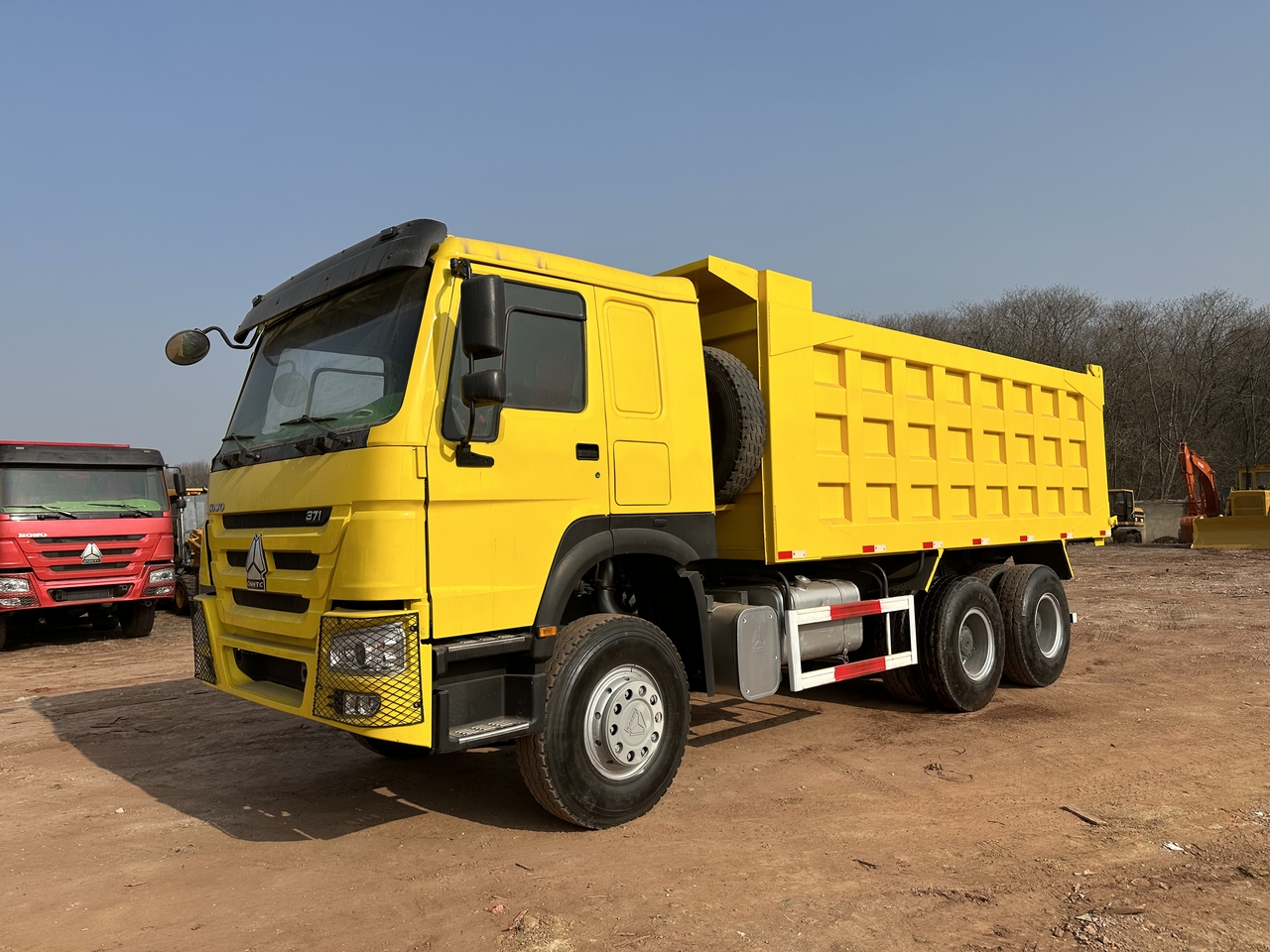 SINOTRUK Howo Dump truck 371 - Kravas automašīna pašizgāzējs: foto 1 SINOTRUK Howo Dump truck 371 - Kravas automašīna pašizgāzējs: foto 1