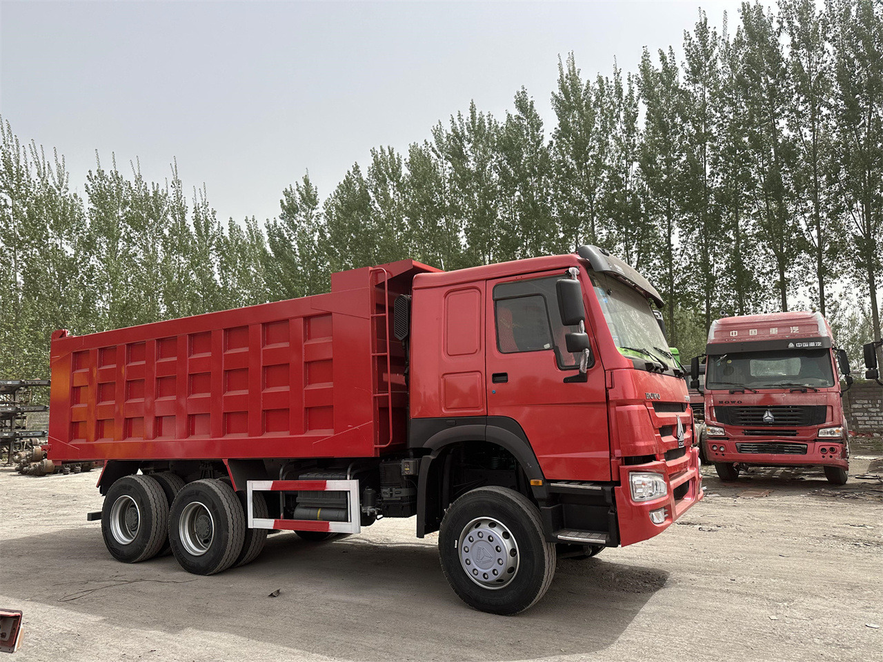 SINOTRUK Howo Dump truck 371 - Kravas automašīna pašizgāzējs: foto 1 SINOTRUK Howo Dump truck 371 - Kravas automašīna pašizgāzējs: foto 1