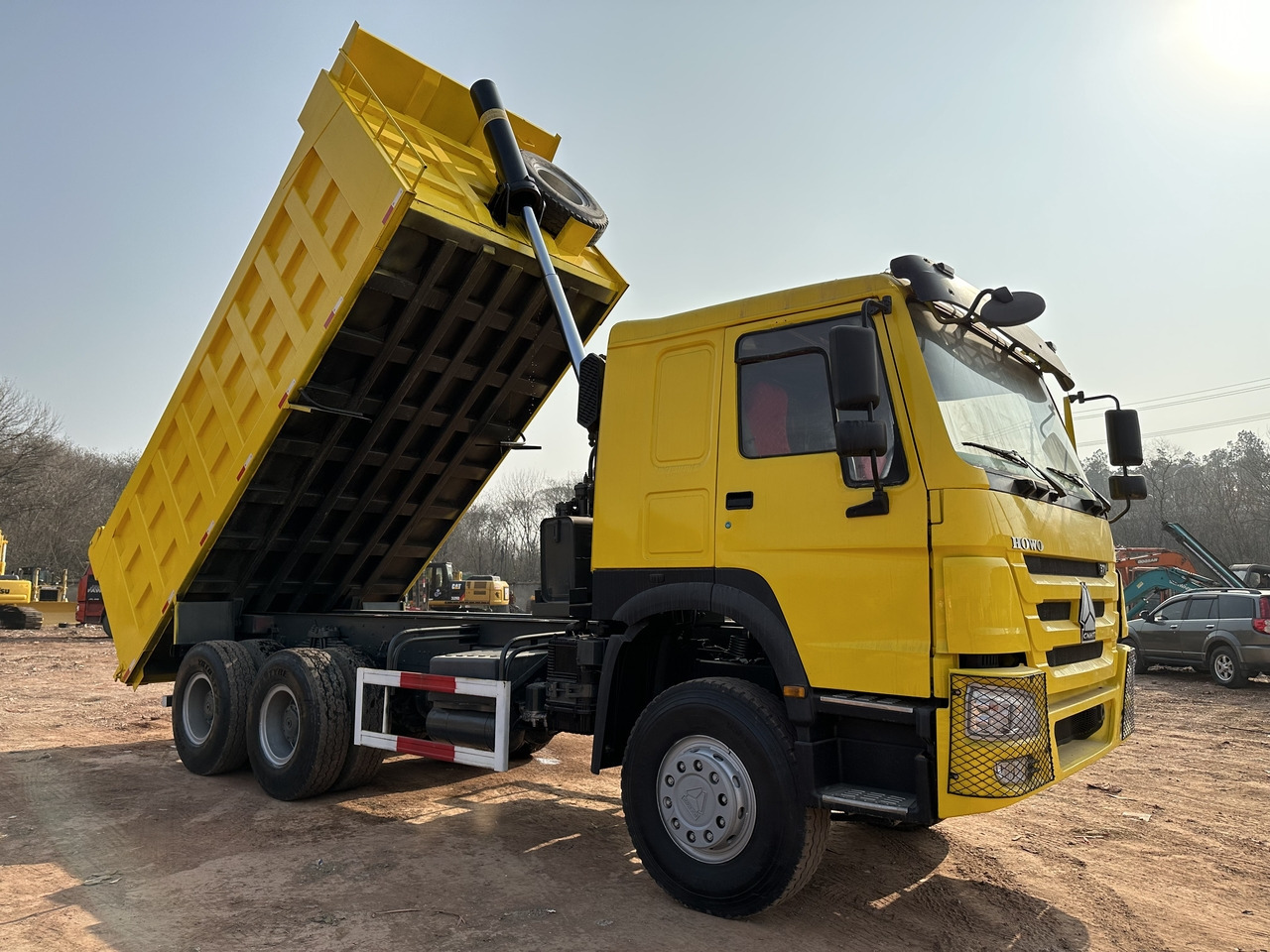 SINOTRUK Howo Dump truck 371 - Kravas automašīna pašizgāzējs: foto 1 SINOTRUK Howo Dump truck 371 - Kravas automašīna pašizgāzējs: foto 1