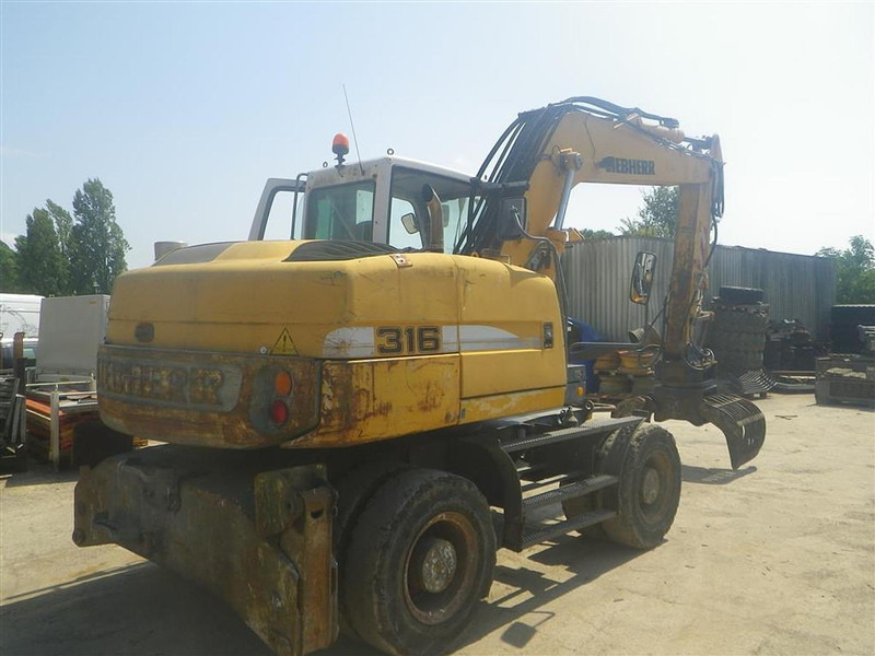 Liebherr A316Li - Ekskavators: foto 1 Liebherr A316Li - Ekskavators: foto 1