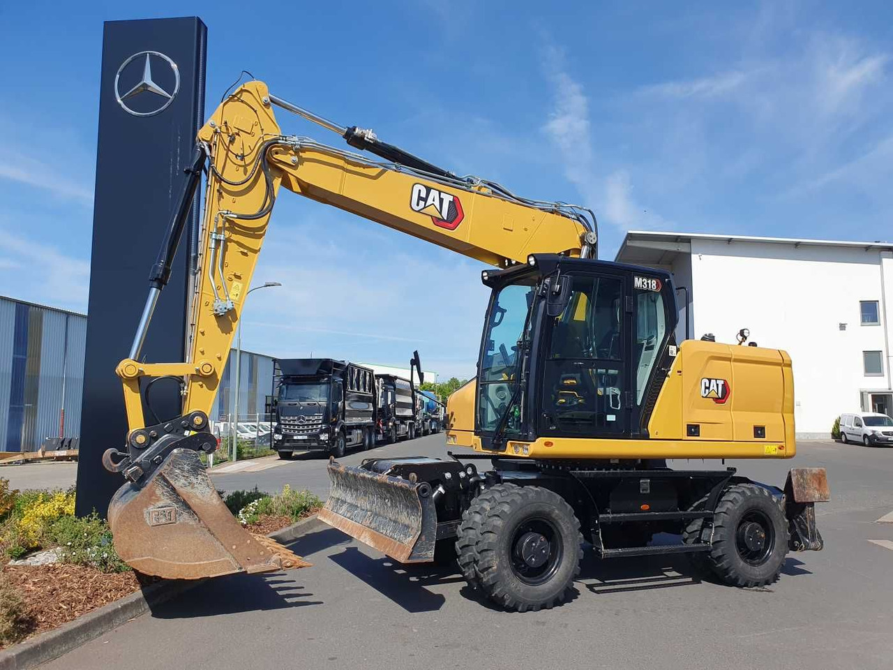 CAT M318 / 2022 / nur 286h! / Tieflöffel / Pratzen - Riteņu ekskavators: foto 1 CAT M318 / 2022 / nur 286h! / Tieflöffel / Pratzen - Riteņu ekskavators: foto 1