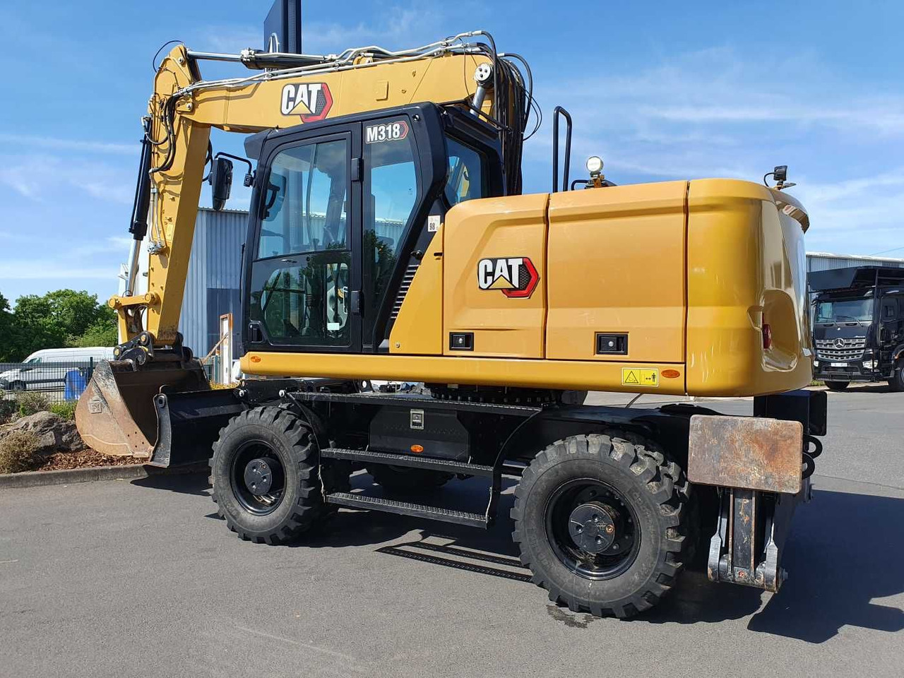 CAT M318 / 2022 / nur 286h! / Tieflöffel / Pratzen - Riteņu ekskavators: foto 3 CAT M318 / 2022 / nur 286h! / Tieflöffel / Pratzen - Riteņu ekskavators: foto 3