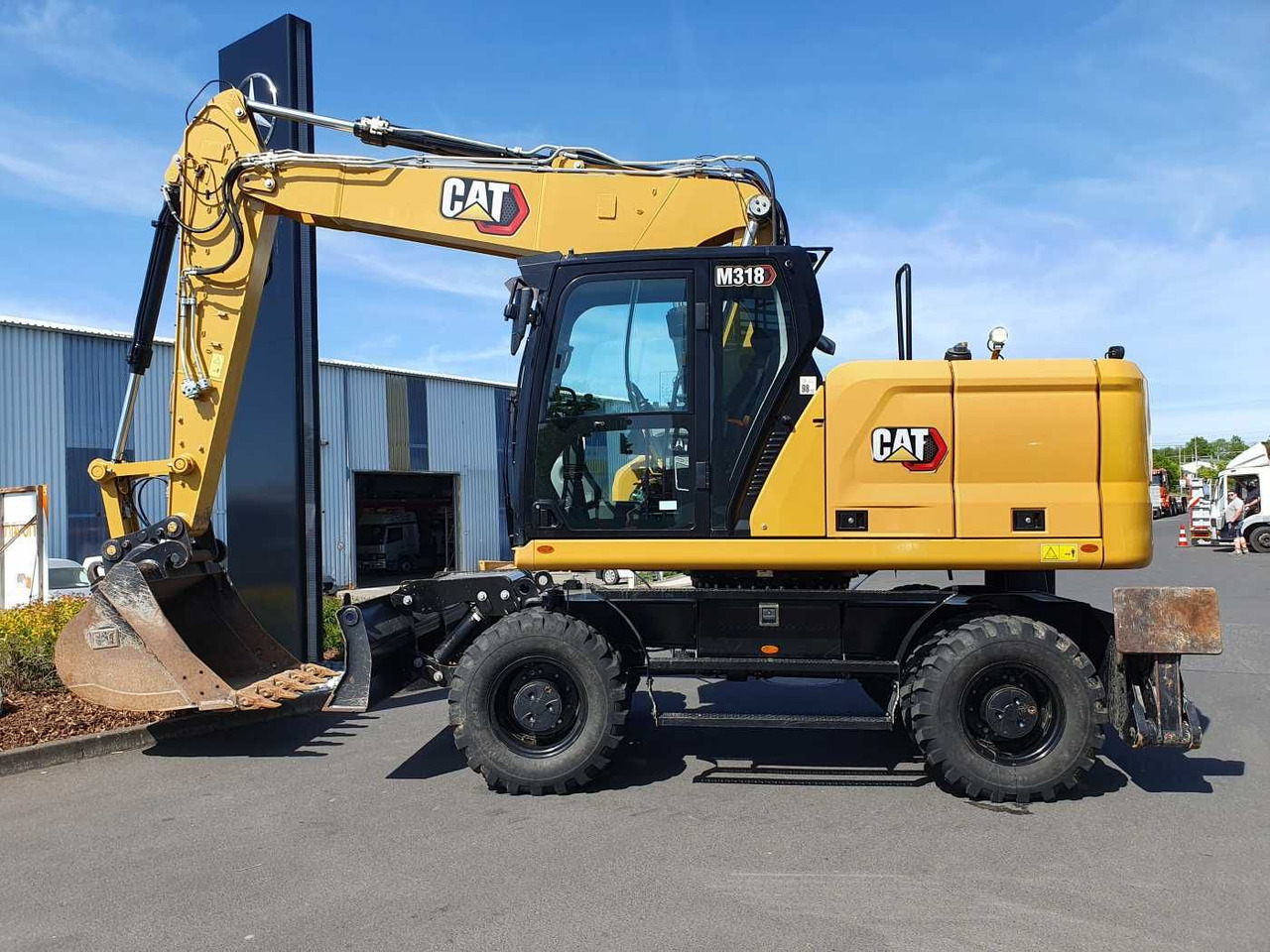 CAT M318 / 2022 / nur 286h! / Tieflöffel / Pratzen - Riteņu ekskavators: foto 2 CAT M318 / 2022 / nur 286h! / Tieflöffel / Pratzen - Riteņu ekskavators: foto 2
