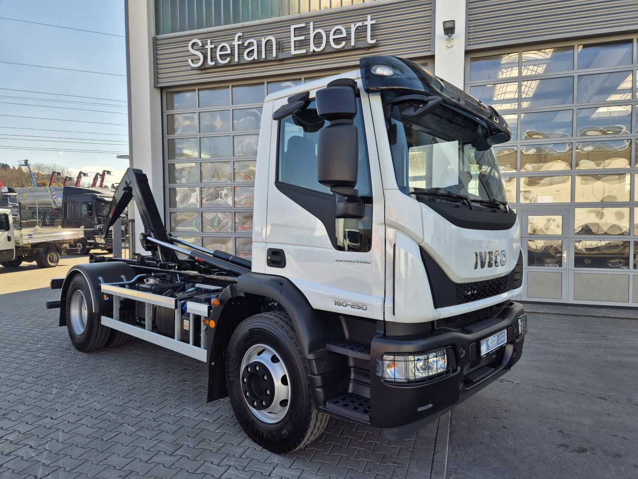 Iveco Eurocargo ML160E25/P HIAB Multilift XR10S4150 - Pacēlājs ar āķi: foto 1 Iveco Eurocargo ML160E25/P HIAB Multilift XR10S4150 - Pacēlājs ar āķi: foto 1