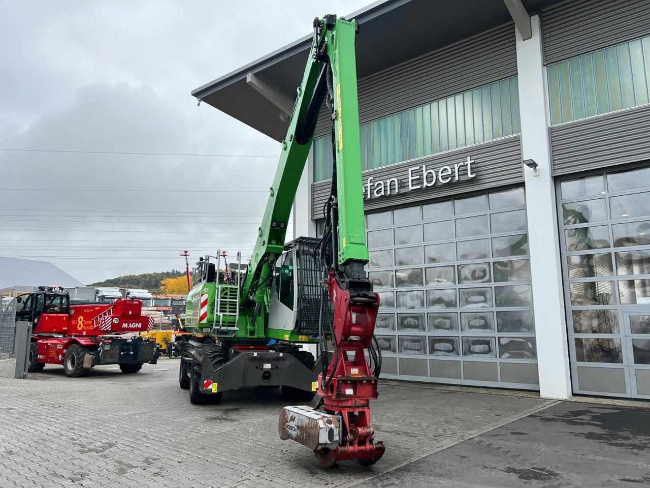 Sennebogen 718 / inkl. Vosch Fällzange / nur 1.965h! - Riteņu ekskavators: foto 3 Sennebogen 718 / inkl. Vosch Fällzange / nur 1.965h! - Riteņu ekskavators: foto 3