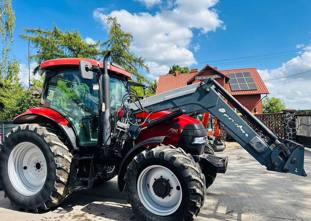 Case IH MXU 115 PRO - Traktors: foto 1 Case IH MXU 115 PRO - Traktors: foto 1