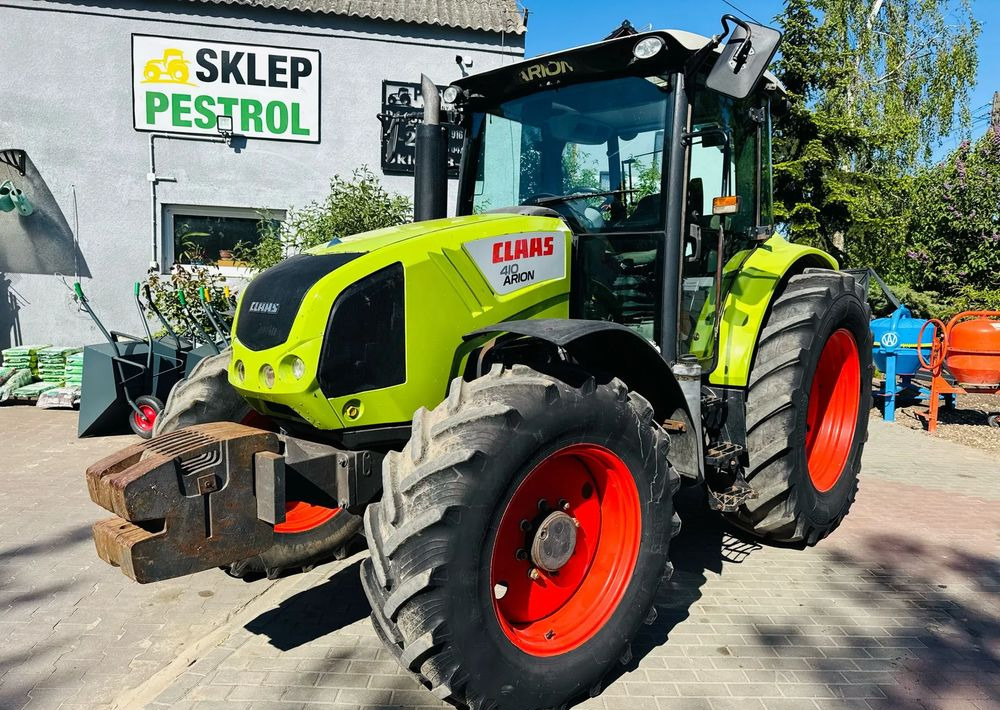 Claas Arion 410 - Traktors: foto 1 Claas Arion 410 - Traktors: foto 1