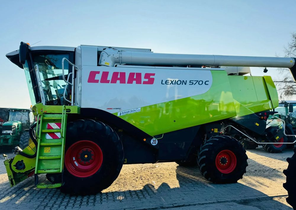 Claas Lexion 570C - Labības kombains: foto 1 Claas Lexion 570C - Labības kombains: foto 1