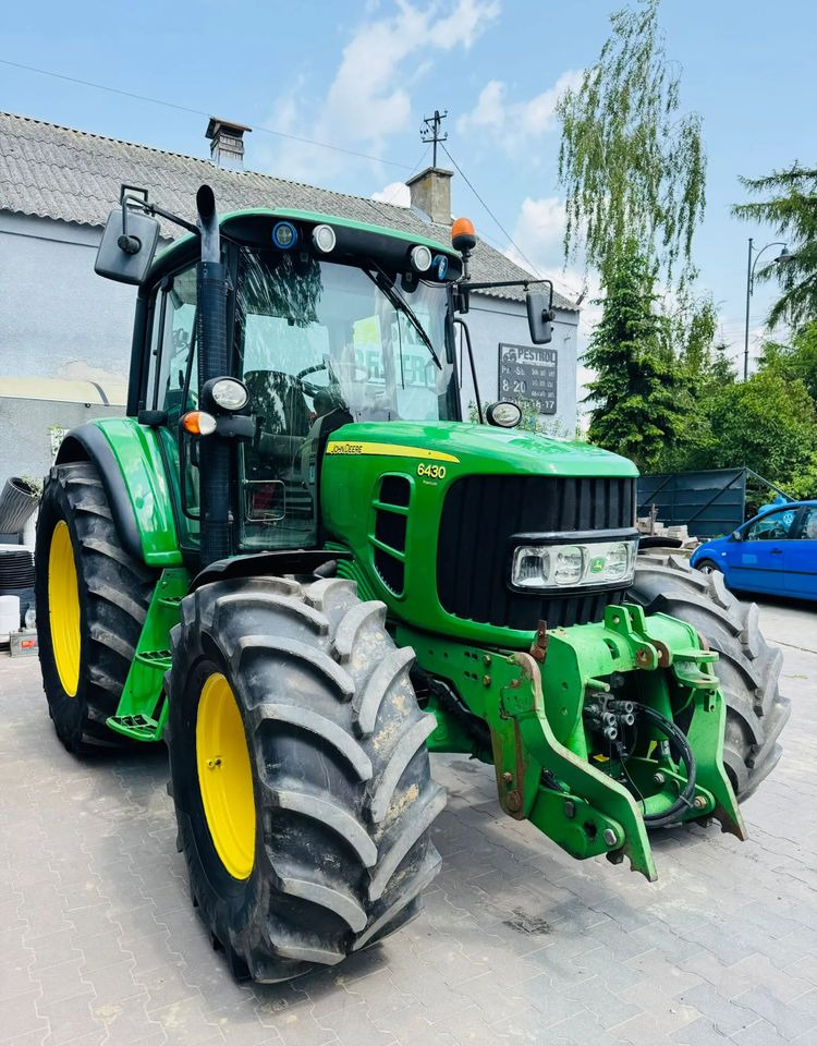 John Deere 6430 - Traktors: foto 2 John Deere 6430 - Traktors: foto 2