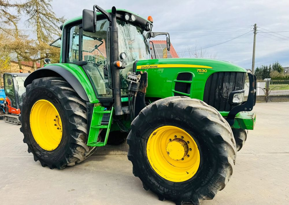 John Deere 7530 - Traktors: foto 1 John Deere 7530 - Traktors: foto 1