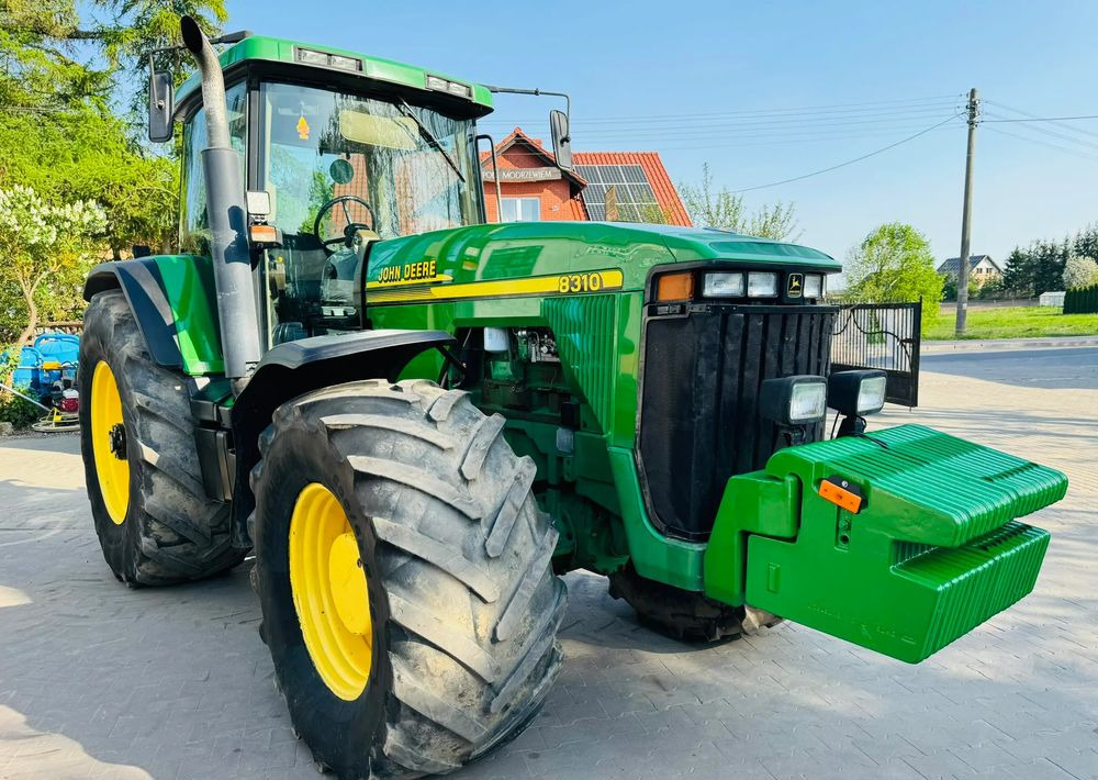John Deere 8310 - Traktors: foto 2 John Deere 8310 - Traktors: foto 2