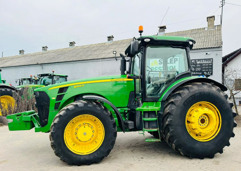 John Deere 8345R - Traktors: foto 1 John Deere 8345R - Traktors: foto 1