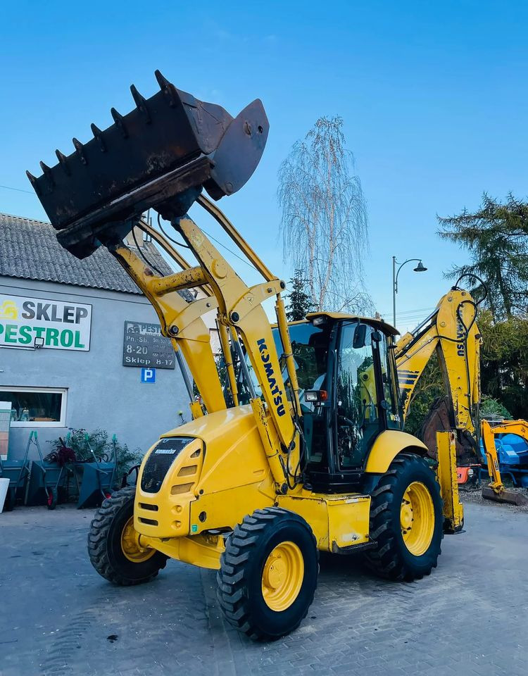 Komatsu WB93R - Ekskavators-iekrāvējs: foto 1 Komatsu WB93R - Ekskavators-iekrāvējs: foto 1