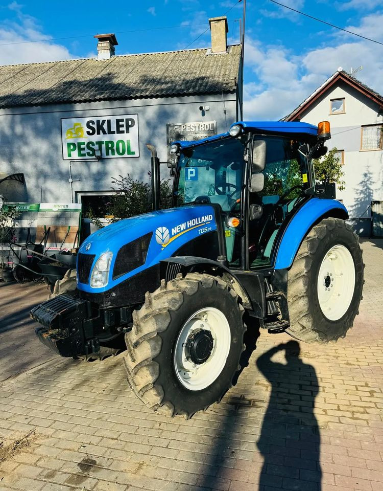 New Holland TD5.95 - Traktors: foto 2 New Holland TD5.95 - Traktors: foto 2