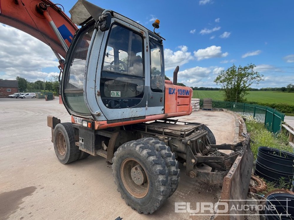 2002 Fiat Hitachi EX135W - Riteņu ekskavators: foto 1 2002 Fiat Hitachi EX135W - Riteņu ekskavators: foto 1