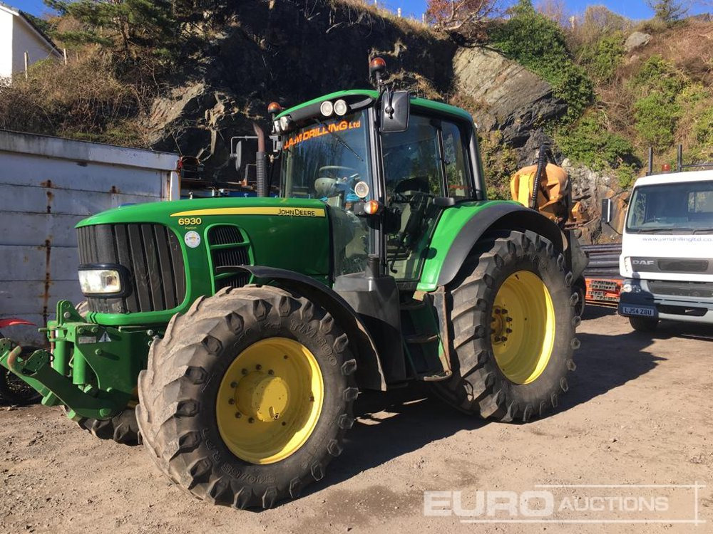 2010 John Deere 6930 Premium - Traktors: foto 1 2010 John Deere 6930 Premium - Traktors: foto 1