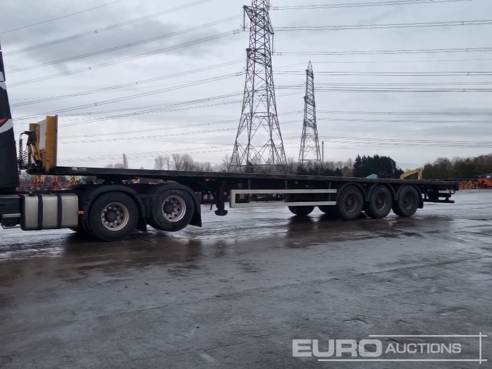 2012 Don-Bur Tri Axle Flat Bed Trailer - Bortu puspiekabe/ Platforma: foto 1 2012 Don-Bur Tri Axle Flat Bed Trailer - Bortu puspiekabe/ Platforma: foto 1