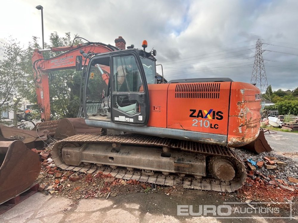 Hitachi ZX210LC-3 - Kāpurķēžu ekskavators: foto 1 Hitachi ZX210LC-3 - Kāpurķēžu ekskavators: foto 1