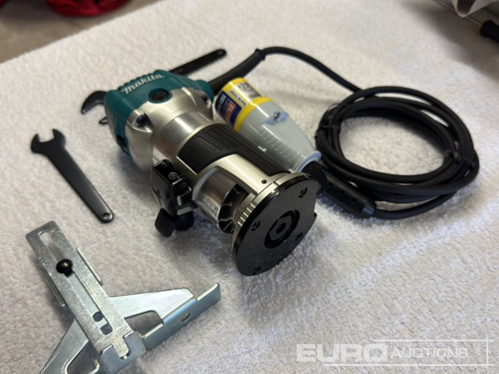 Makita RT0701C - Celtniecības maisītājs: foto 2 Makita RT0701C - Celtniecības maisītājs: foto 2