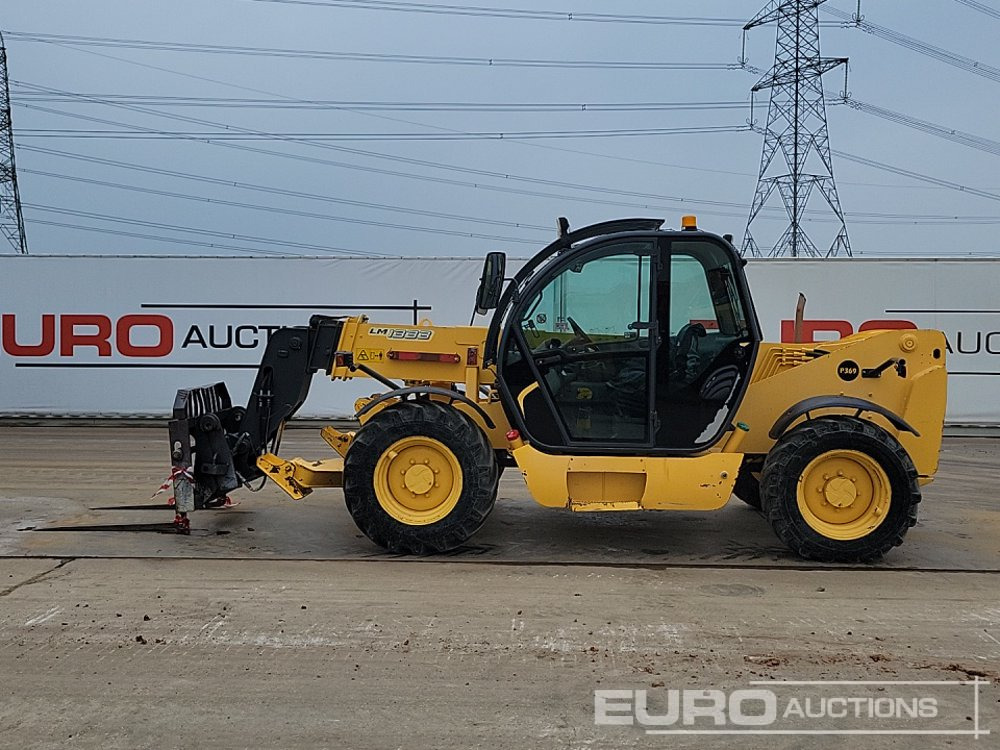 New Holland LM1333 - Teleskopiskais iekrāvējs: foto 2 New Holland LM1333 - Teleskopiskais iekrāvējs: foto 2
