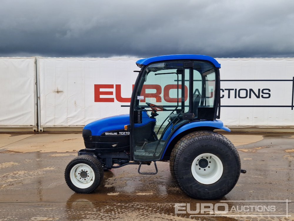 New Holland TC27D - Mini traktors: foto 2 New Holland TC27D - Mini traktors: foto 2