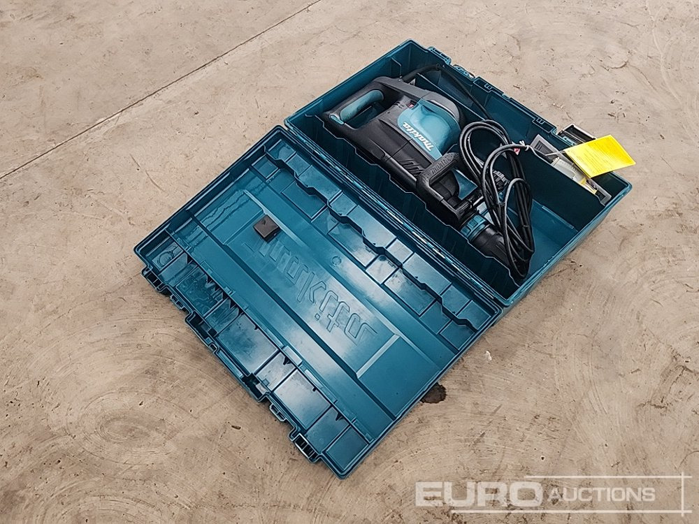 Unused Makita HM1203C Demolition Hammer 110V - Celtniecības maisītājs: foto 5 Unused Makita HM1203C Demolition Hammer 110V - Celtniecības maisītājs: foto 5