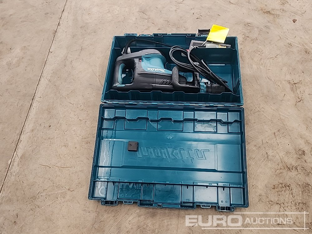 Unused Makita HM1203C Demolition Hammer 110V - Celtniecības maisītājs: foto 4 Unused Makita HM1203C Demolition Hammer 110V - Celtniecības maisītājs: foto 4