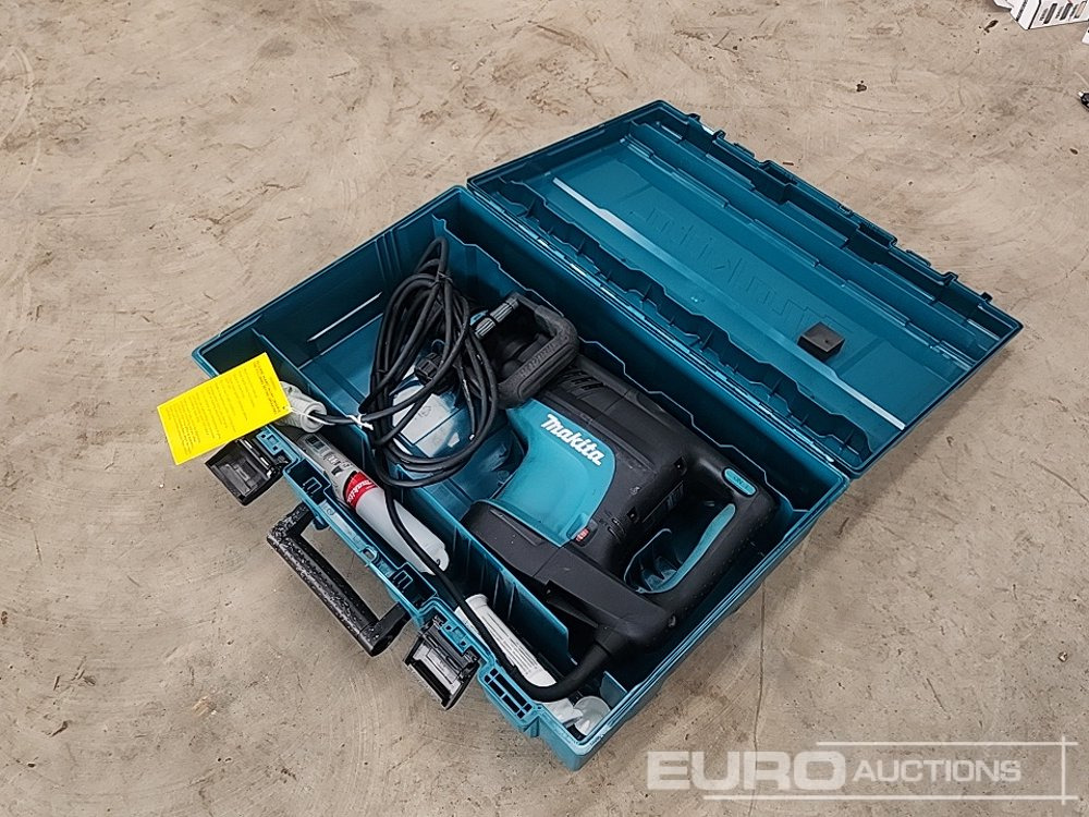 Unused Makita HM1203C Demolition Hammer 110V - Celtniecības maisītājs: foto 1 Unused Makita HM1203C Demolition Hammer 110V - Celtniecības maisītājs: foto 1