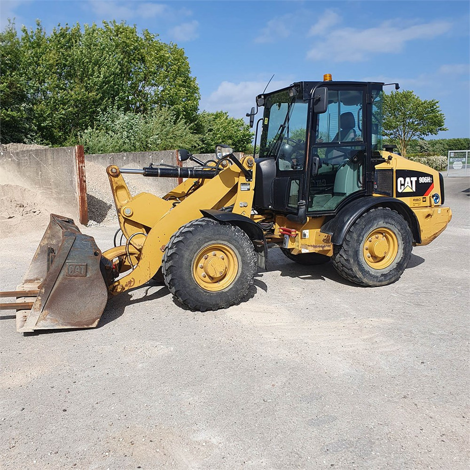 Caterpillar 906 H2 - Riteņu iekrāvējs: foto 1 Caterpillar 906 H2 - Riteņu iekrāvējs: foto 1