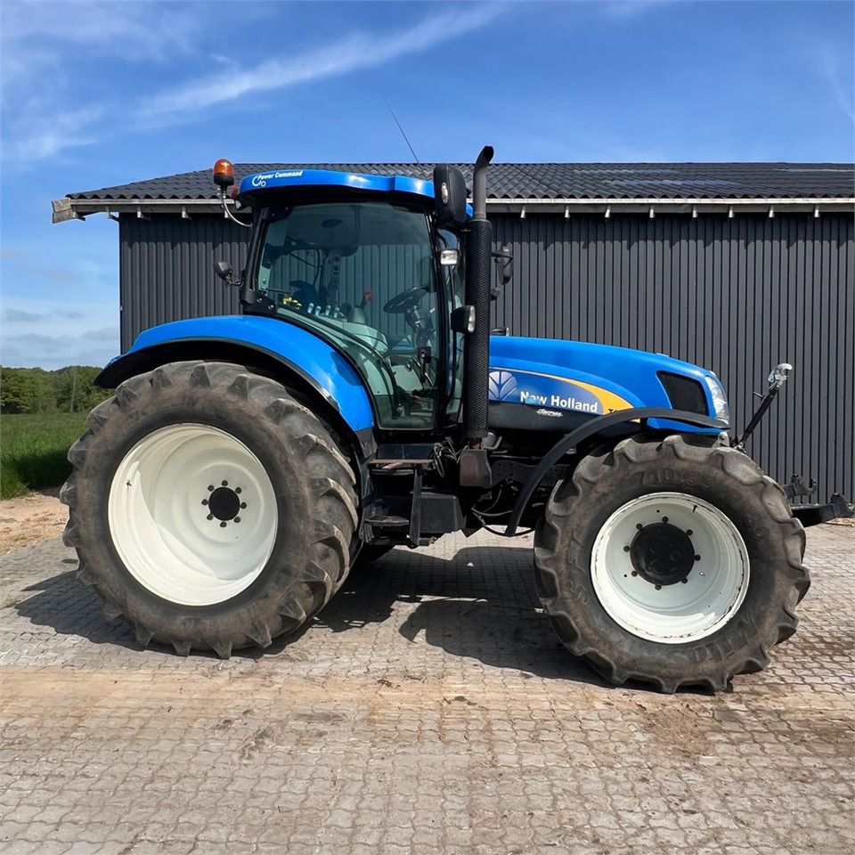 New Holland T6050 - Traktors: foto 3 New Holland T6050 - Traktors: foto 3