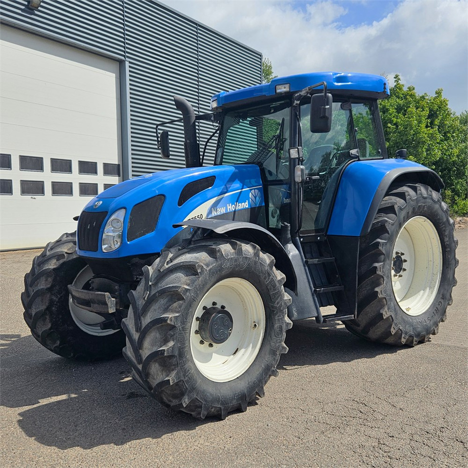 New Holland T7550 - Traktors: foto 1 New Holland T7550 - Traktors: foto 1