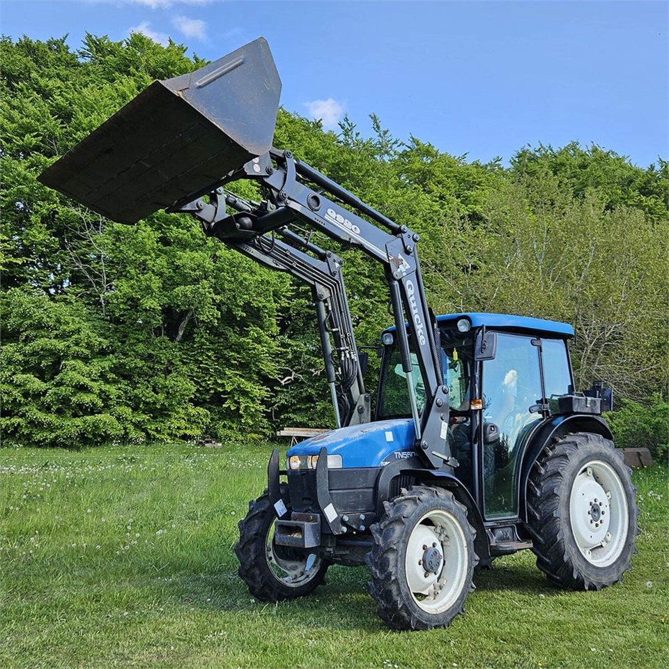 New Holland TN55D - Traktors: foto 5 New Holland TN55D - Traktors: foto 5