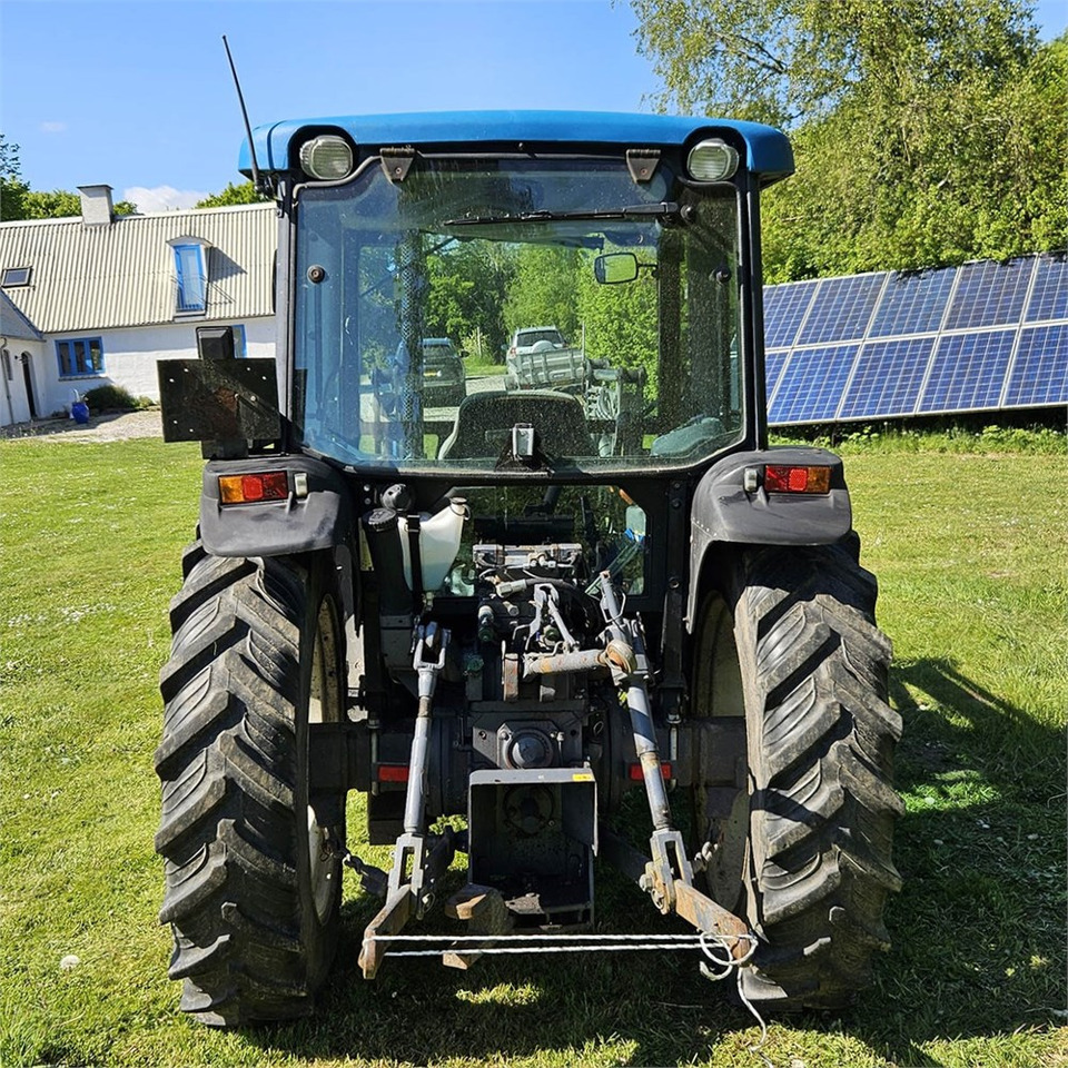 New Holland TN55D - Traktors: foto 4 New Holland TN55D - Traktors: foto 4