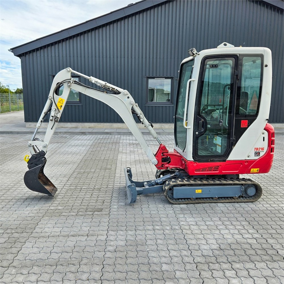 Takeuchi TB216 - Mini-ekskavators: foto 1 Takeuchi TB216 - Mini-ekskavators: foto 1