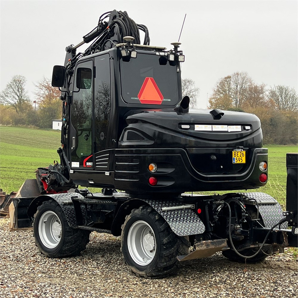 Takeuchi TB295 W - Riteņu ekskavators: foto 5 Takeuchi TB295 W - Riteņu ekskavators: foto 5