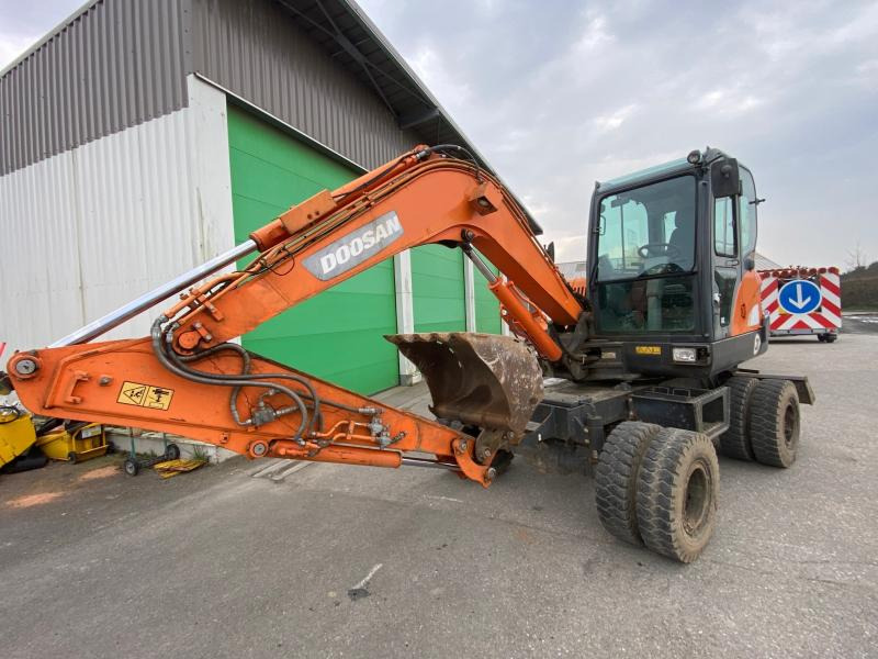 Doosan DX 55W - Riteņu ekskavators: foto 3 Doosan DX 55W - Riteņu ekskavators: foto 3